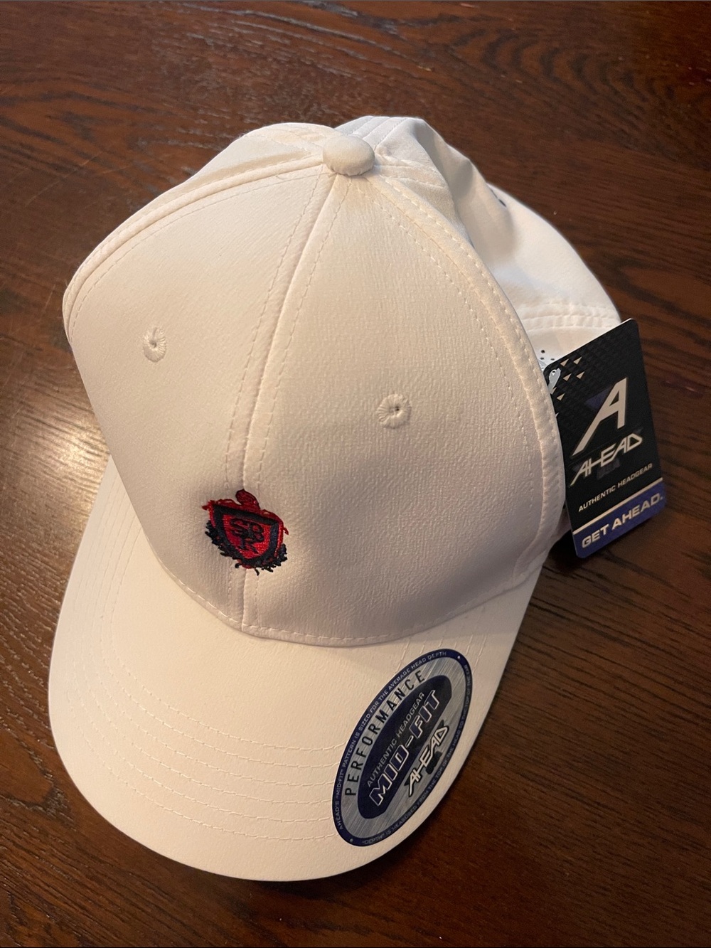 Ahead White Performance Baseball Cap with Red Crest Embroidery